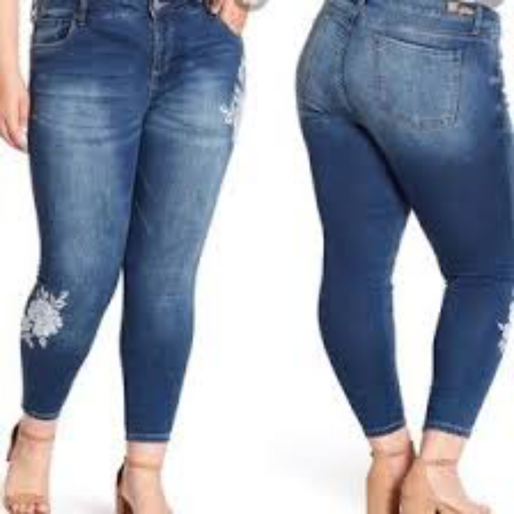 Jeans with white floral detail.